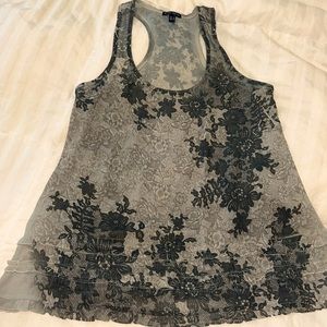 Beaufort weight blouse. Dress it up or down. Racerback. Ruffled bottom.